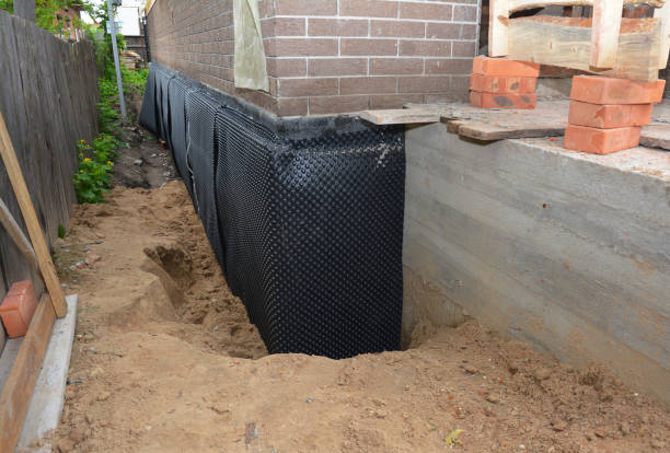 Happy homeowners after waterproofing job in Evansport